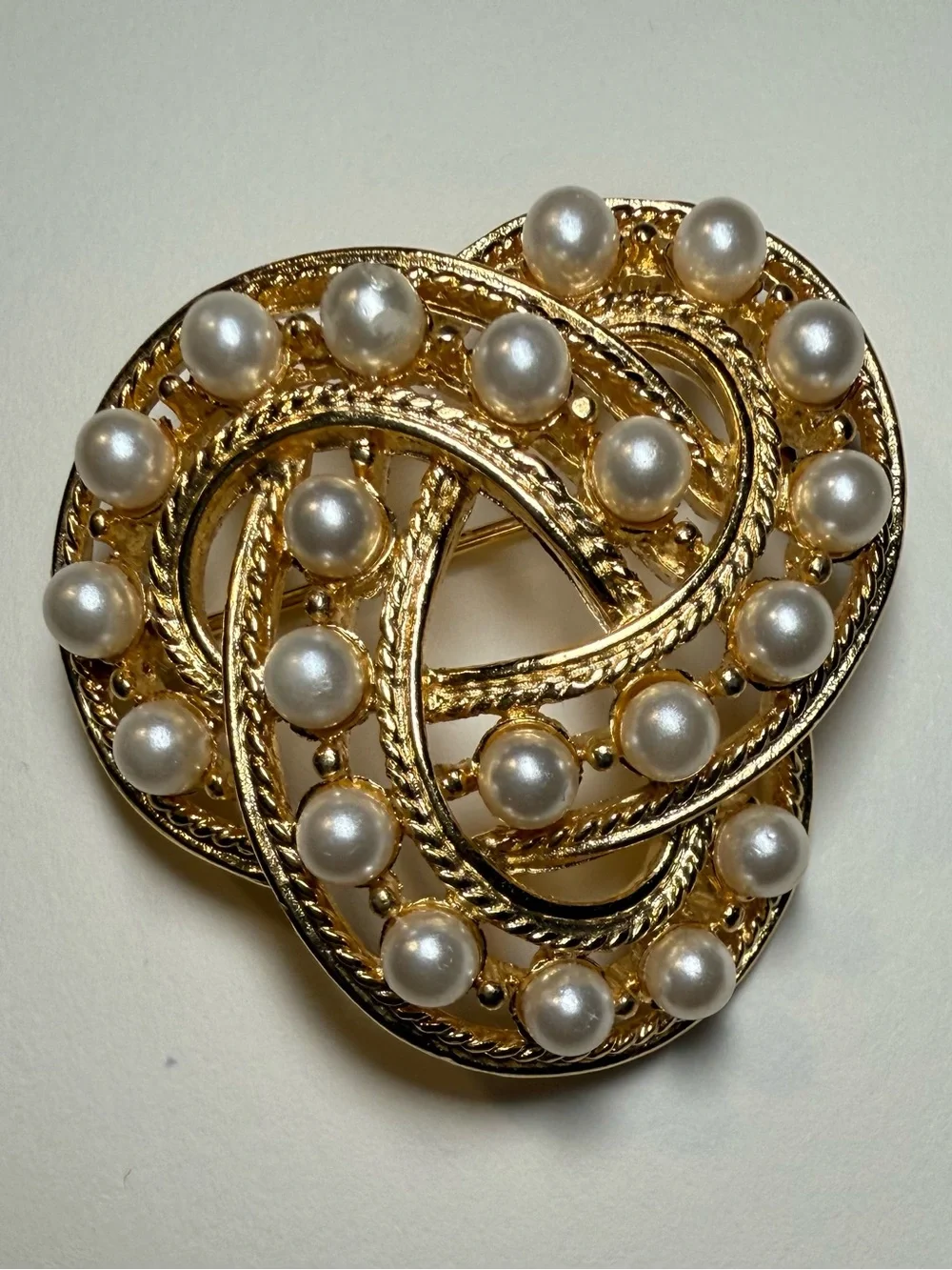 Vintage Celtic Trinity Knot Brooch. Gold plated with Faux Pearl Accents